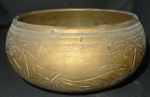Bowl coming from a Buddha statue Bowl coming from a Buddha statue