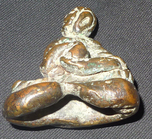 Begging Buddha living under the water amulet Begging Buddha living under the water amulet