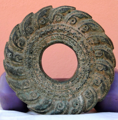 Disk shaped Khmer deity amulet (Bayon) Disk shaped Khmer deity amulet (Bayon)