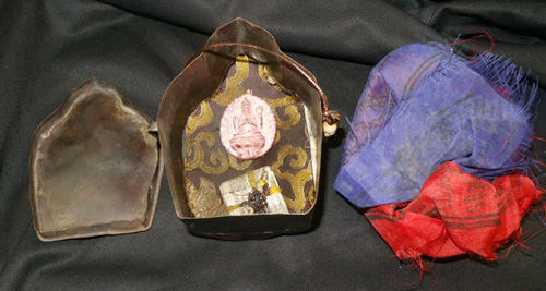 Yamataka, gau with magic texts and Buddha Yamataka, gau with magic texts and Buddha