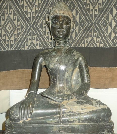 Lao Buddha on open lace base Lao Buddha on open lace base