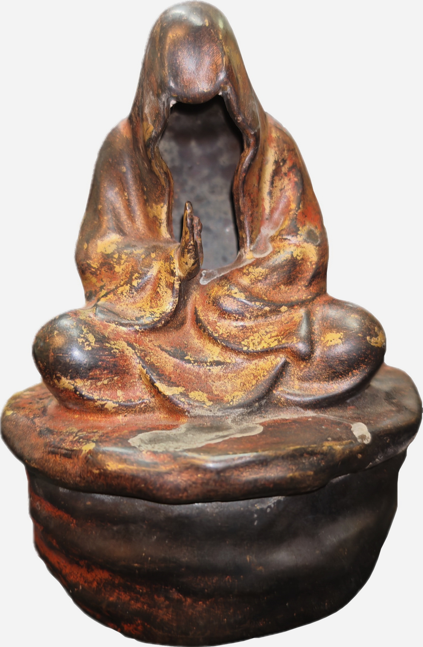 Insence burner as a person in prayer